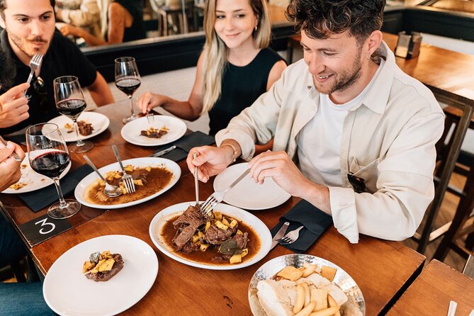Madrid Tapas & Wine Tour with Rooftop Views and Local Guide - What the guides add to the experience