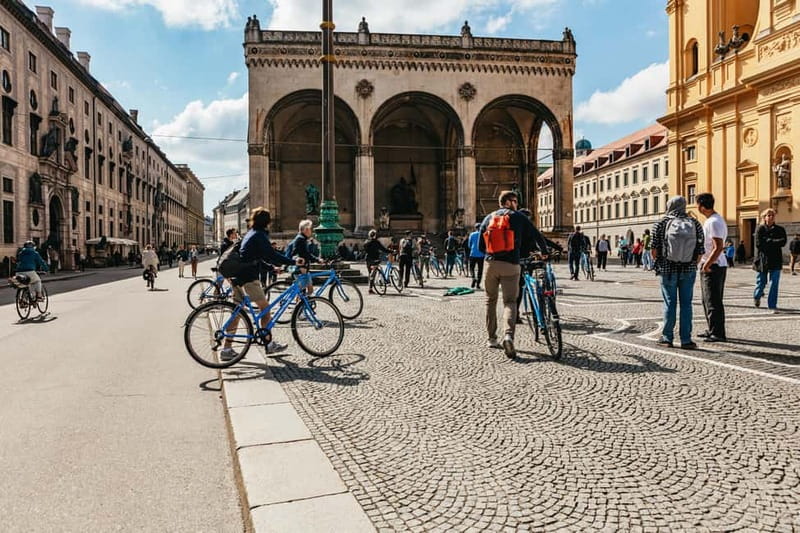 Munich: Guided City Tour by Bike with Beer Garden Stop - The English Garden and the Eisbach wave