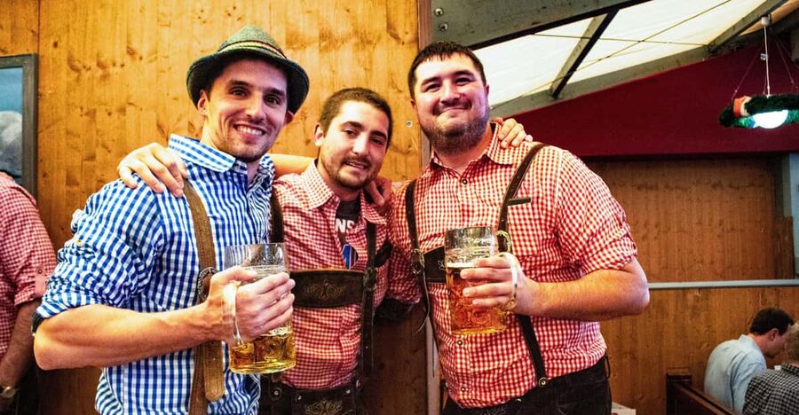 Munich: Oktoberfest Tour with Tent Reservation, Food & Beer - Seeing the rides, markets, and traditions first