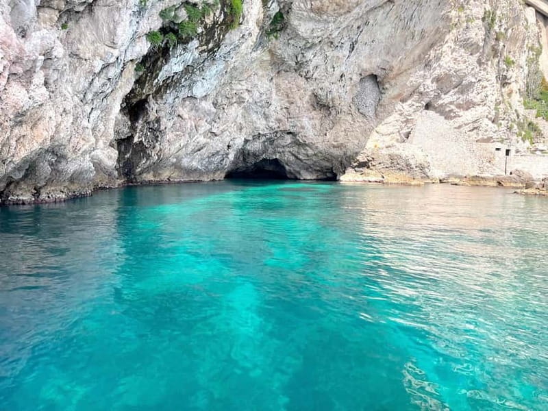 Naxos: Taormina Boat Tour with Snorkeling and Prosecco - Prosecco, Sicilian snacks, and music on board