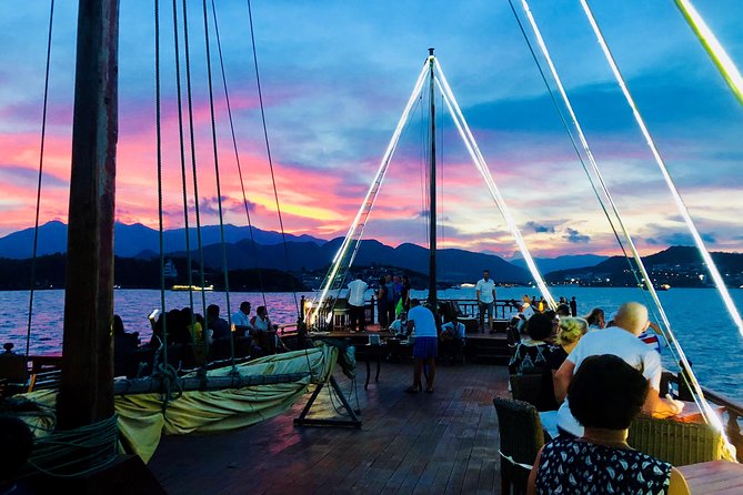 Nha Trang Sunset Cocktails and Dinner Cruise - City lights after dark