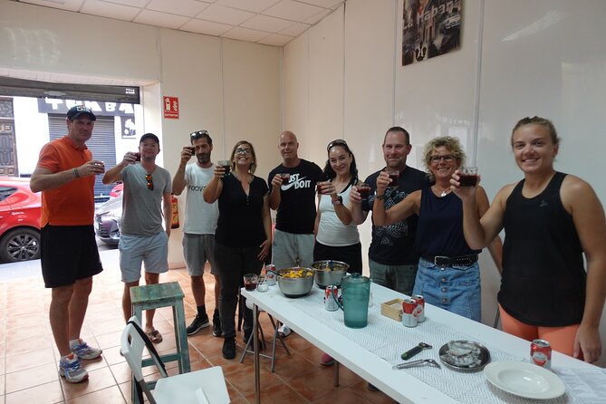 Paella & Sangria Class with Tapas and Market Visit - Tapas and sangria while the paella cooks