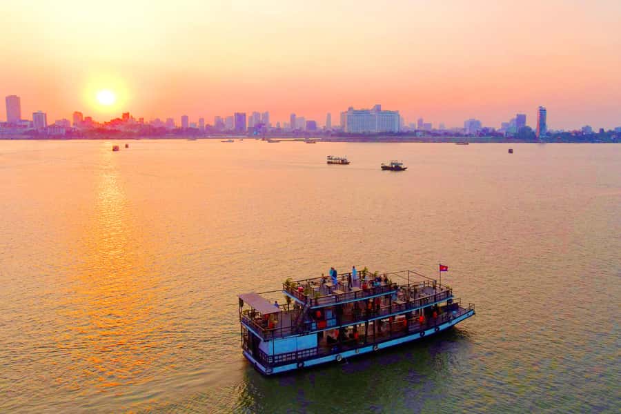 Phnom Penh: Sunset Cruise with Unlimited Beer &Fruit platter - Getting to the boat by tuk-tuk