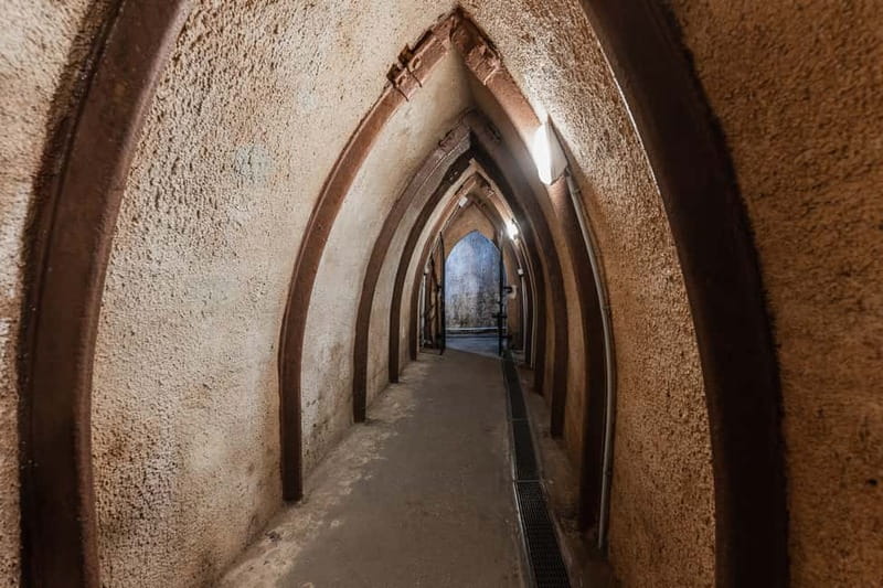 Pilsen: Historic Underground Tour with a Glass of Beer - Passageways, wells, and medieval household life