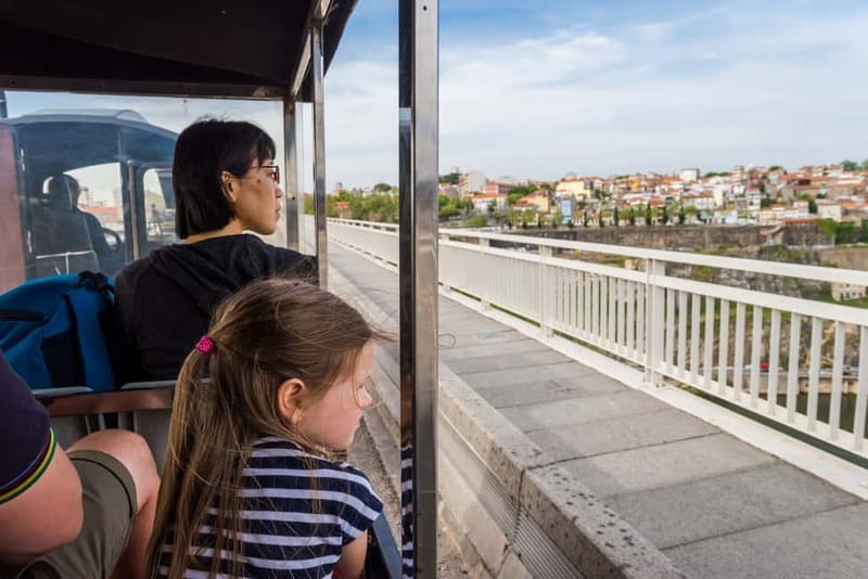 Porto: Magic Train Tour and Port Wine Cellar with Tastings - The city circuit and its major sights