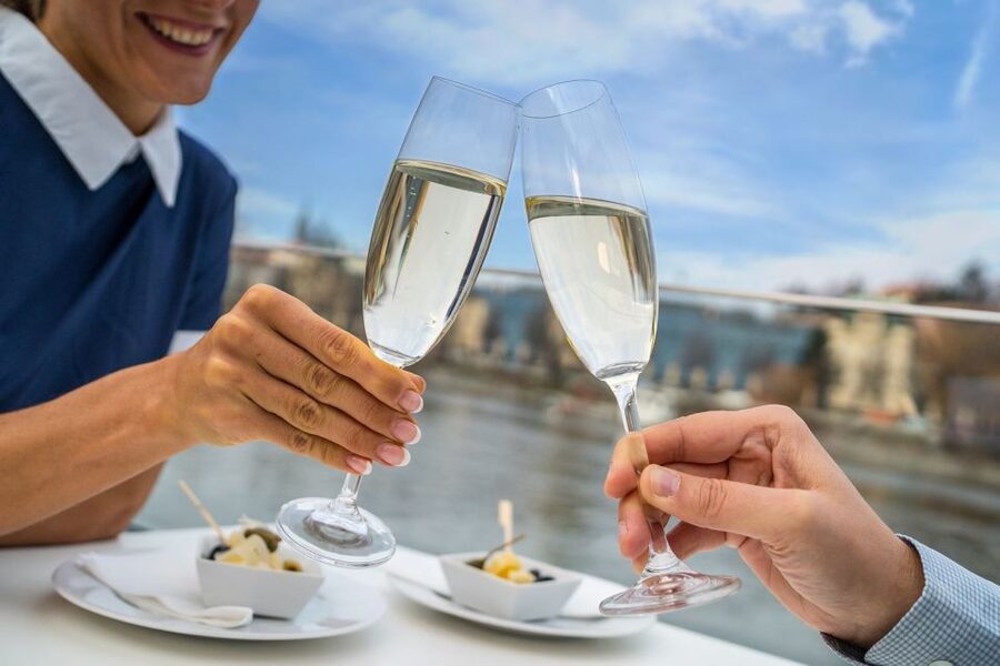 Prague: Evening Vltava River Eco Cruise with Prosecco - Crowds, seating, and accessibility