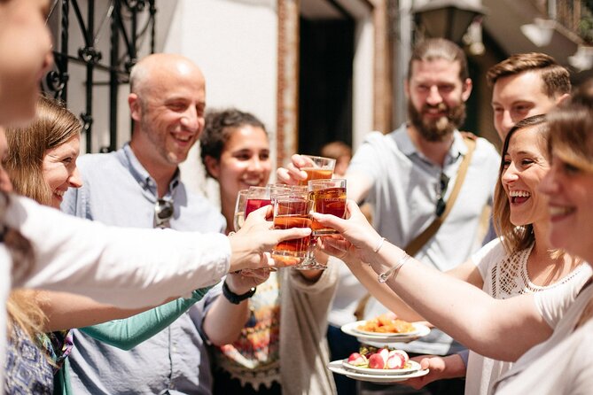 Private Seville Tapas & History Tour - Freiduría Reina Victoria: adobo, fried fish, and the April Fair