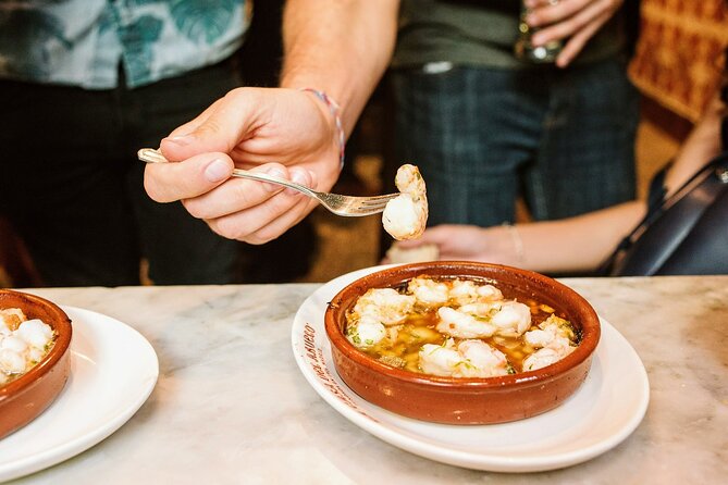 Private Seville Tapas & History Tour - Bar Bistec: a final plate of garlic shrimp and home cooking