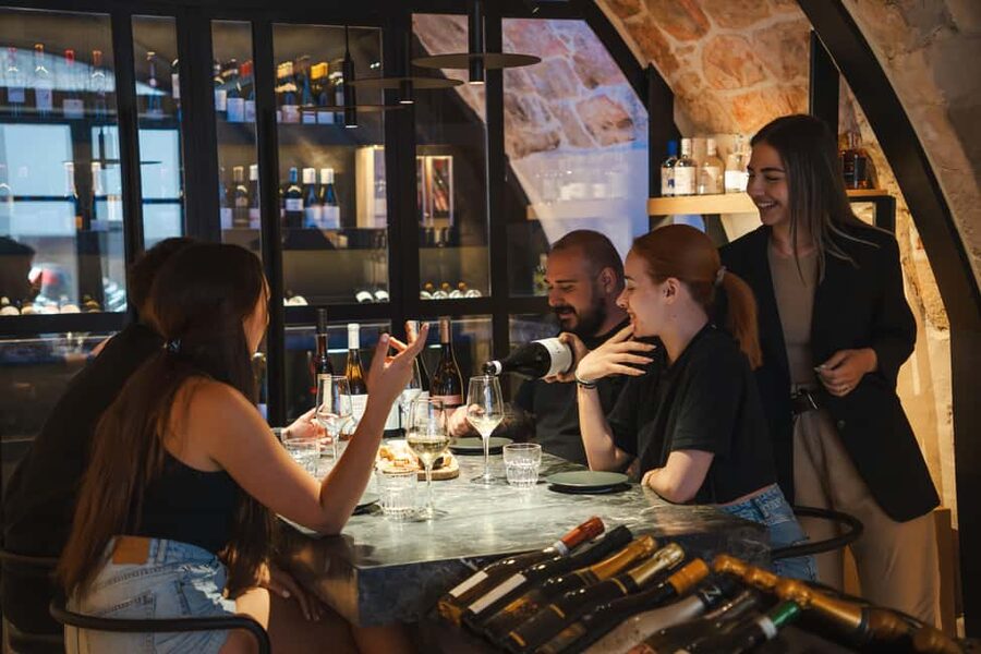 Rethymno: Cretan Wine Tasting Guided Tour with Local Food - Five glasses in the heart of Rethymno