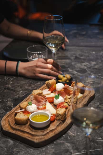 Rethymno: Cretan Wine Tasting Guided Tour with Local Food - Dakos, olives, cheese, and the right amount of food