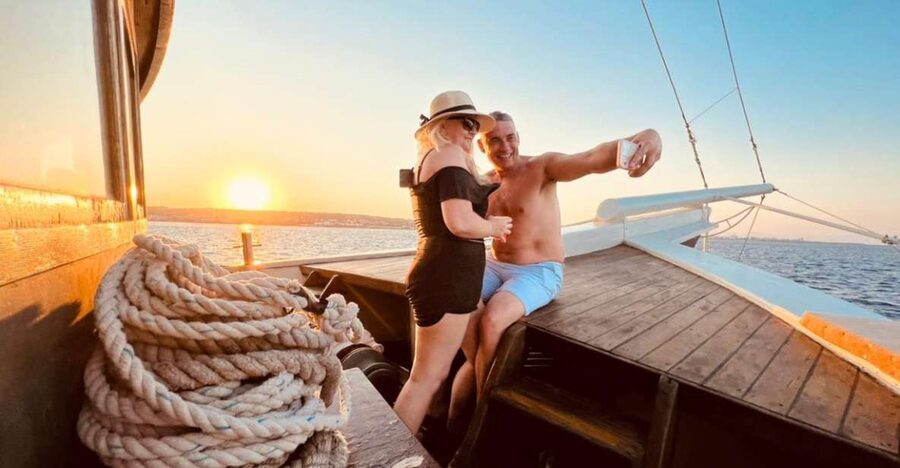 Rhodes: Sunset Cruise with Unlimited Aperol, Beer, and Wine - Leaving Mandraki Harbour in the late afternoon