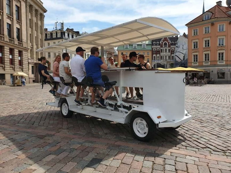 Riga: Beer or Cider Bike Tour - Settling onto the 15-person bike