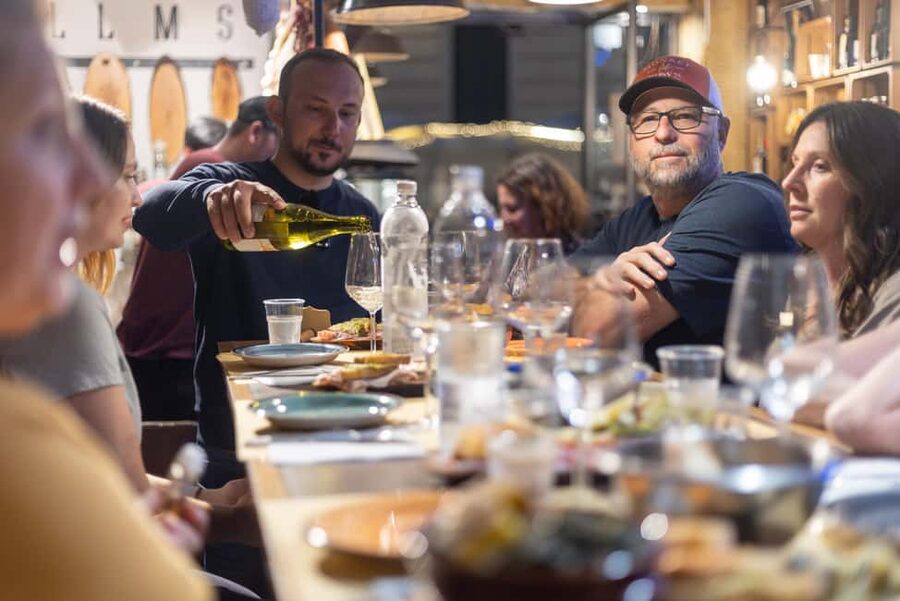 Rome: E-Bike Night Tour with Food and Wine Tasting - The food stop: cheese, cured meat, and wine