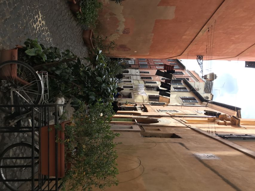 Rome: Trastevere Guided Food and Wine Tour with 20+ Tastings - Handmade pasta and pizza from a wood-fired oven