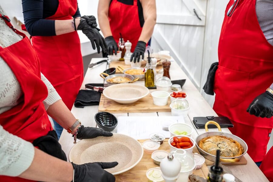 Santorini: Cooking Class with Lunch and Wine Tasting - Cooking Greek food beside Kamari’s Black Beach