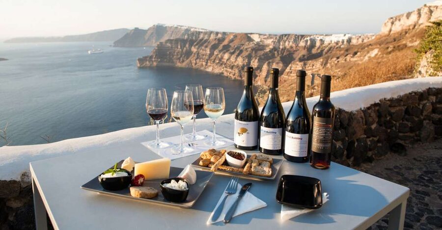 Santorini: Three Wineries and One Brewery Tour with Tastings - Art Space combines wine, art, and old cellars