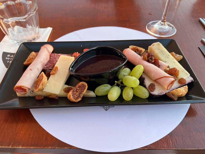Santorini: Wine Tasting Tour with Snacks - Guides, group size, and the human side