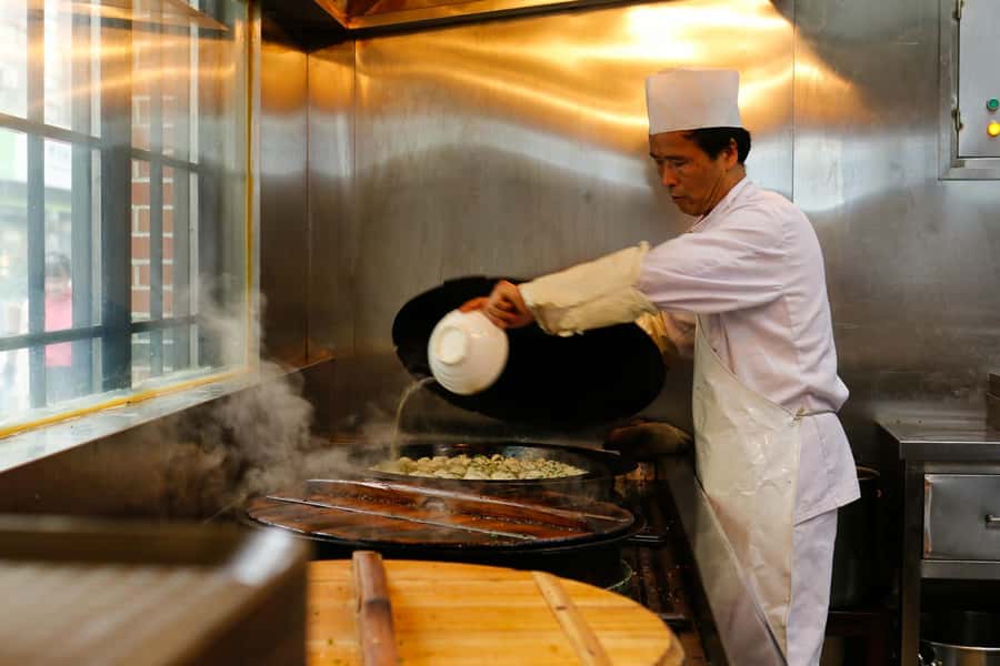 Shanghai: 3-Hour Local Food Tasting Tour - Walking through two versions of central Shanghai