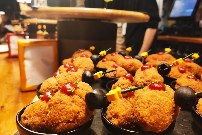 Spanish Wine and Tapas Tour in a Local Neighborhood in Barcelona - The guides shape the evening