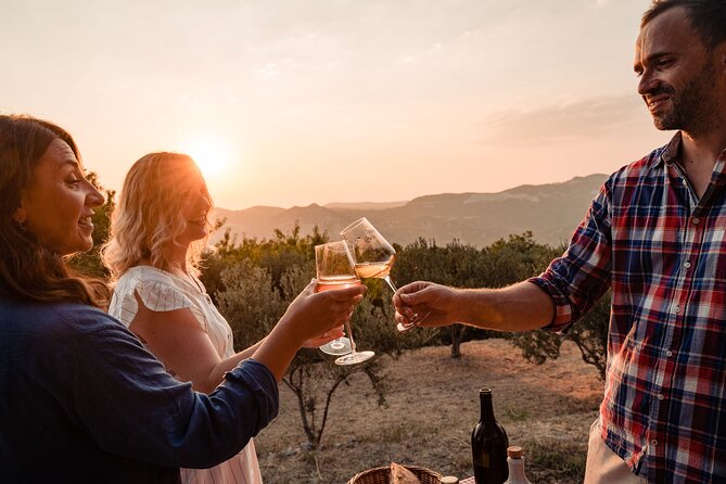Sunset wine tasting in vineyard - Who will enjoy this experience most?