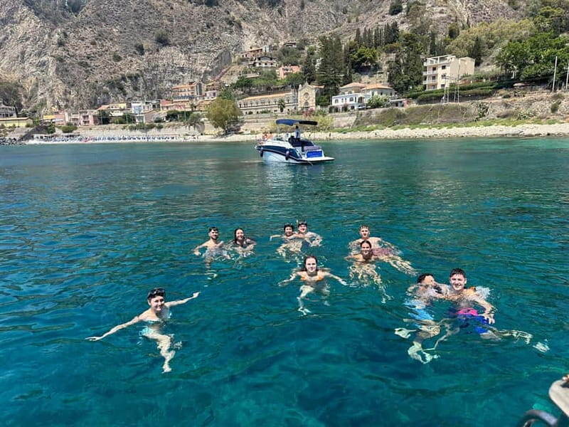 Taormina: Boat Tour with Sicilian Wine Tasting - Leaving Spisone Beach for Taormina’s coast