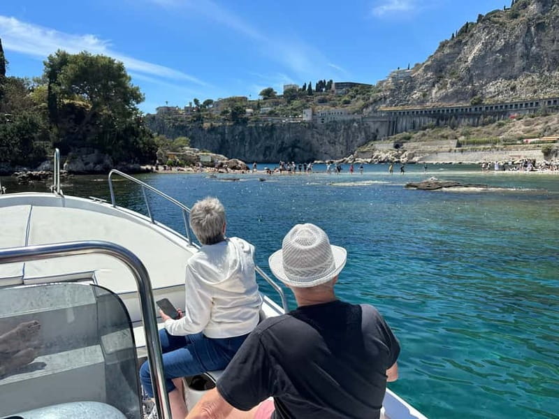 Taormina: Boat Tour with Sicilian Wine Tasting - Sicilian wine, cold cuts, and traditional dishes
