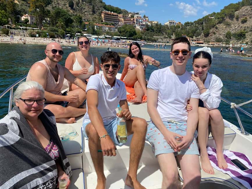 Taormina: Boat Tour with Sicilian Wine Tasting - The first coastal views, caves, and photo stops
