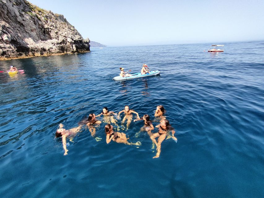Taormina: Coastal Highlights Cruise with Wine & Food Tasting - Swimming and snorkeling near the coves