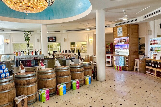 Topper's Rhum Distillery Tour in St Maarten - Arriving with a lagoon-side rhum punch