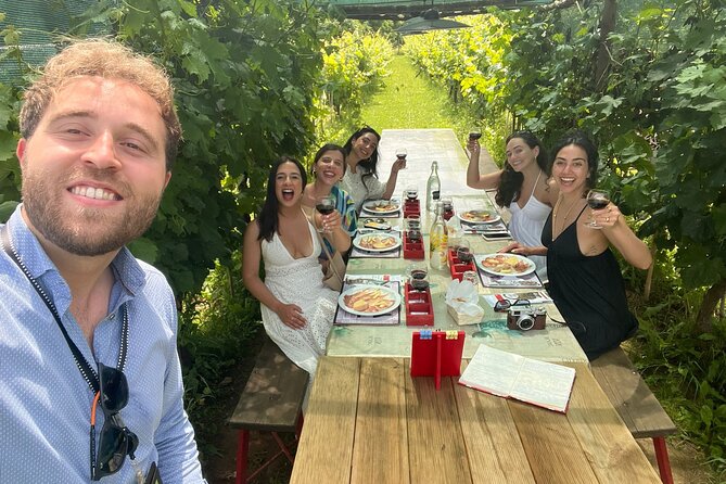 Tuscan Wine Tour in Lucca by van - Second winery: lunch among the vines