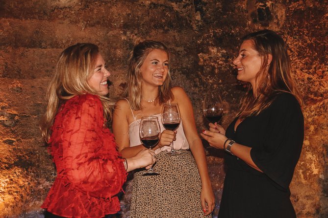 Valencia Old Town Tour with Wine & Tapas in 11th Century Historic Monument - Regional wines and a social table