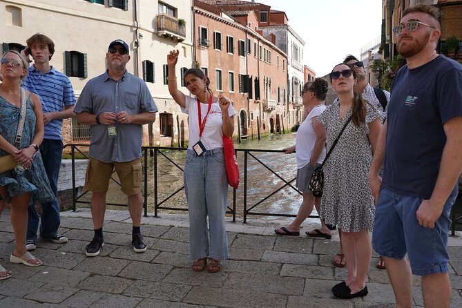 Venice Like a Local: Food, Wine & Spritz Tour with Traghetto Ride - Rialto Market, wine, and backstreet cicchetti