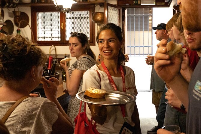 Venice Like a Local: Food, Wine & Spritz Tour with Traghetto Ride - Ponte di Rialto and San Polo after dark