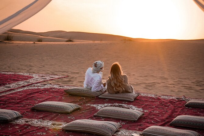 VIP Dubai Sunset Desert Safari: Camel Ride, BBQ, Unlimited Spirit - Camel riding and sandboarding at the Bedouin-style camp