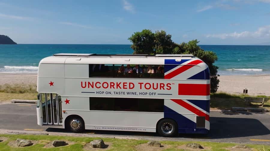 Waiheke Island: Scenic Island Wine Tour & Local Wine Tasting - Guides who turn transfers into part of the tour